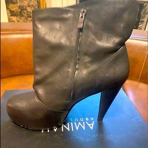 Black boots. 100% leather.